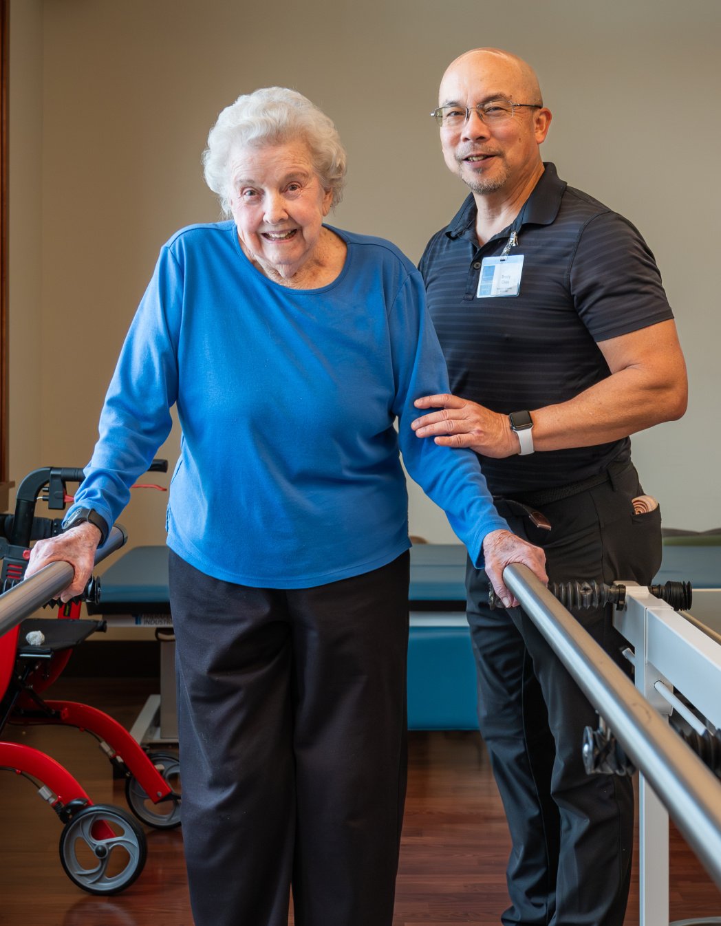 Therapist assisting a resident in therapy